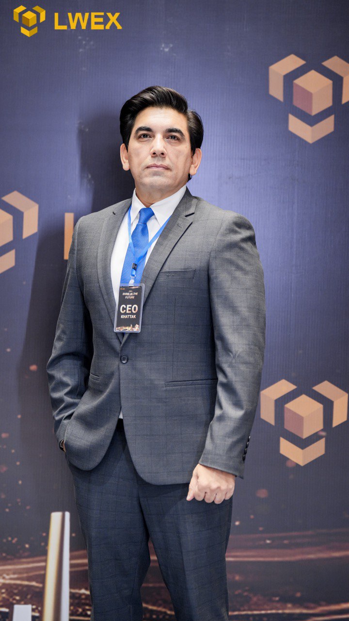 Badge marked “CEO / Khattak”